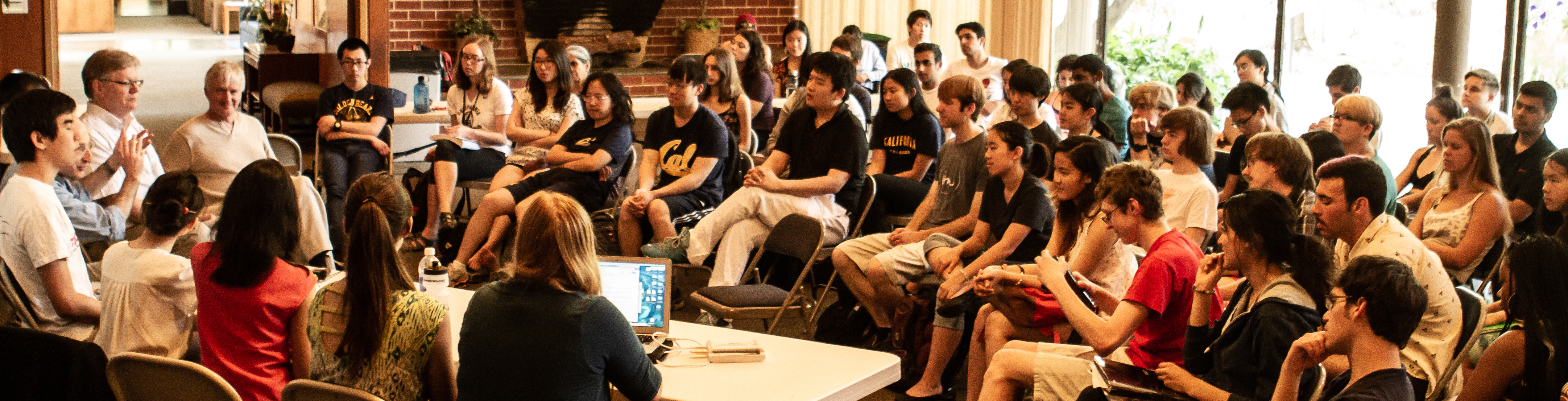 Students engaged in group discussion during the class